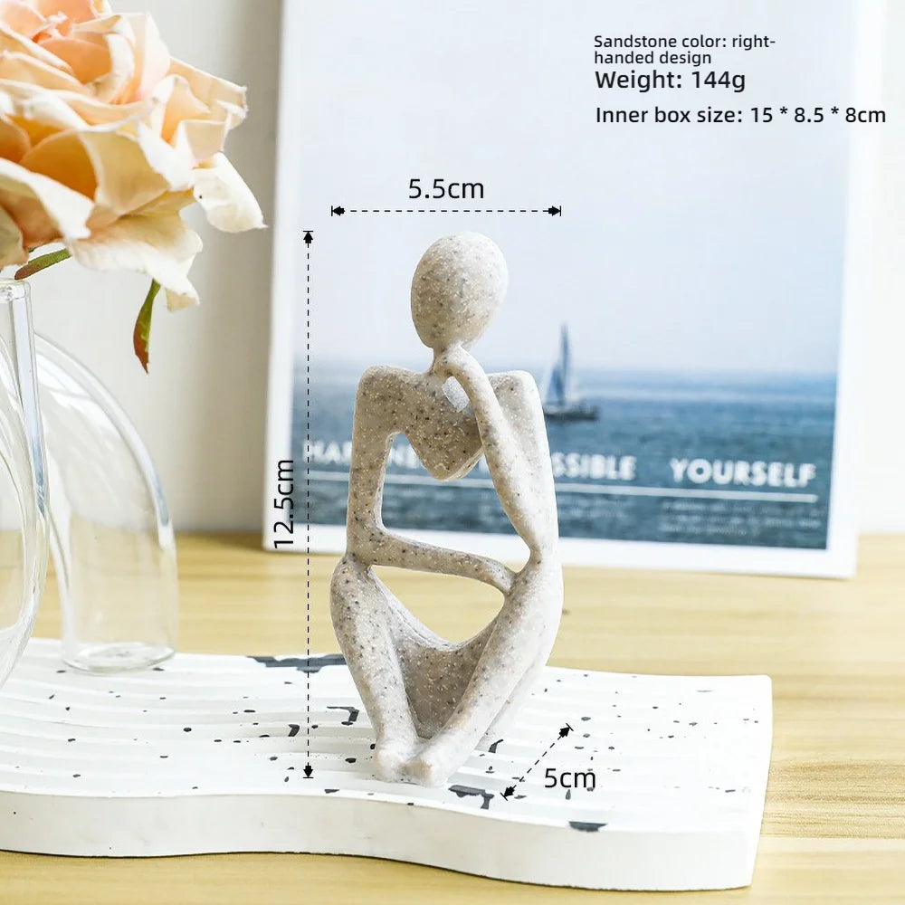 Escultura Figura Sentada
