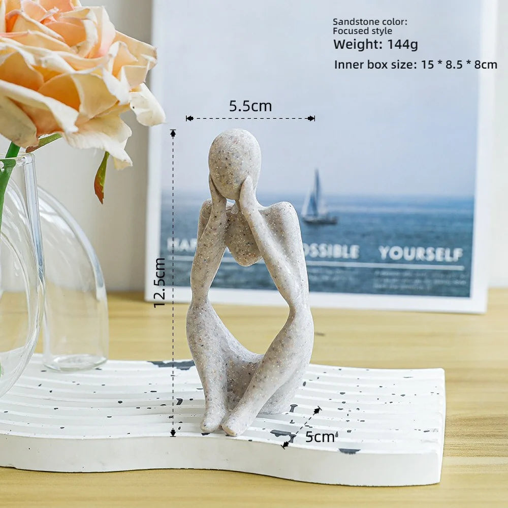 Escultura Figura Sentada