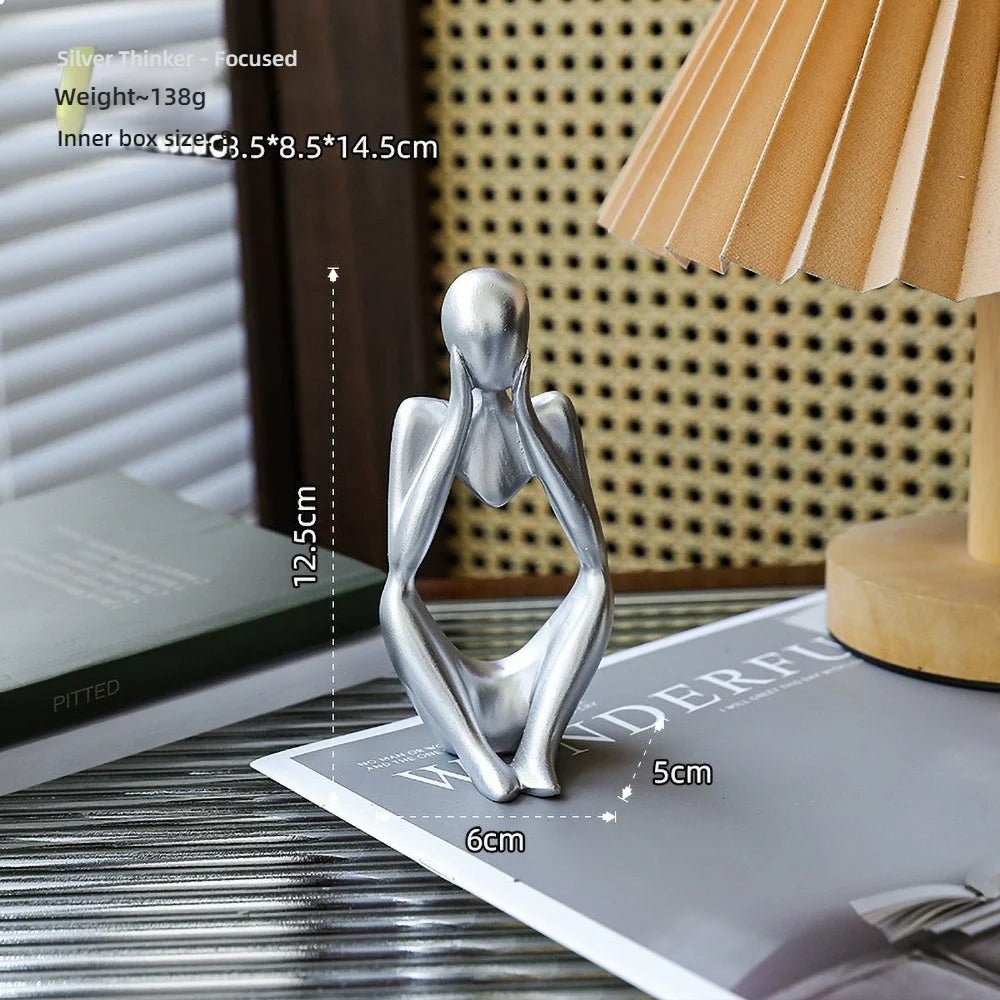 Escultura Figura Sentada