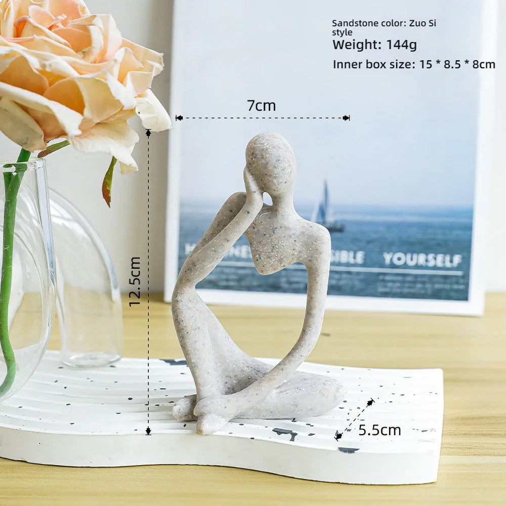 Escultura Figura Sentada