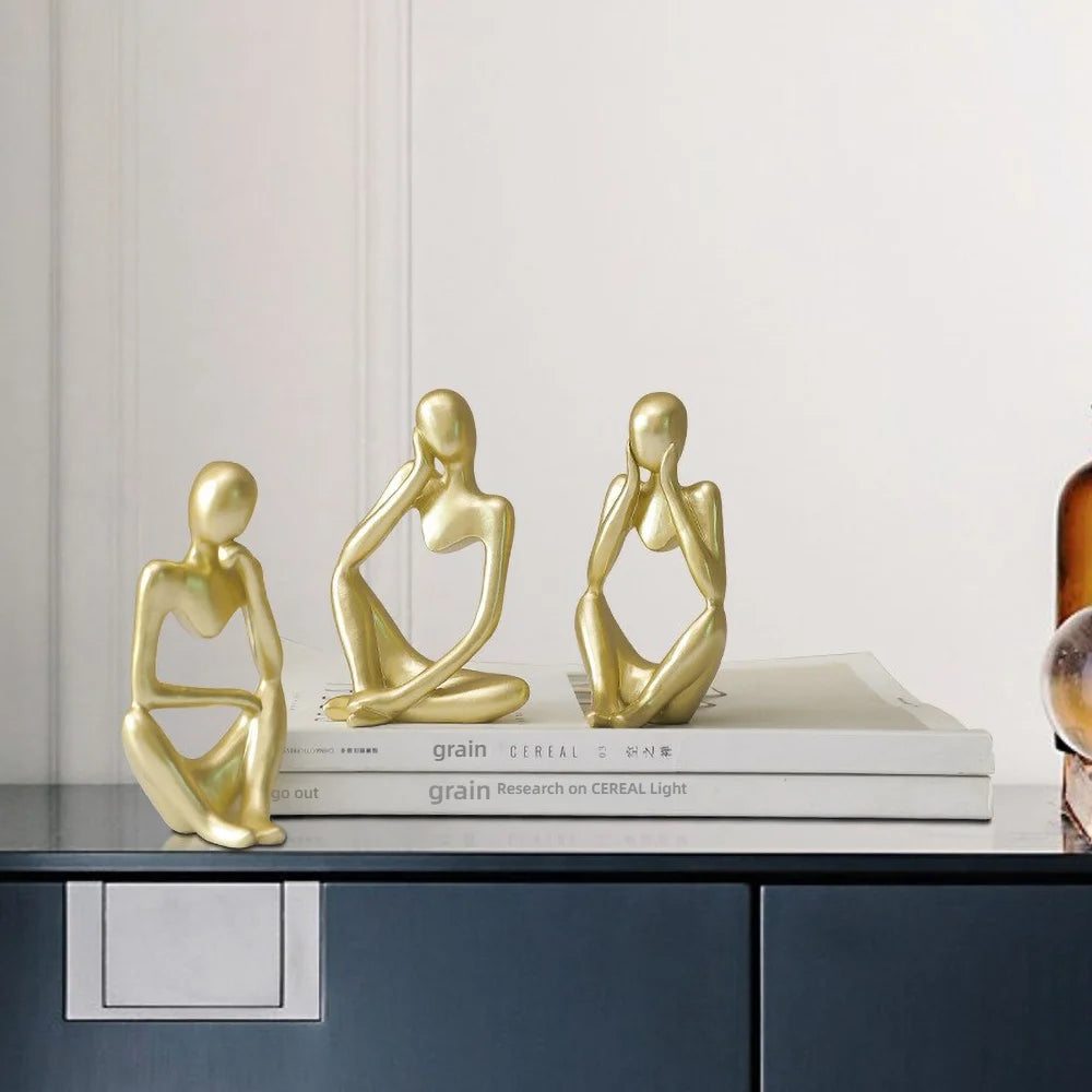 Escultura Figura Sentada