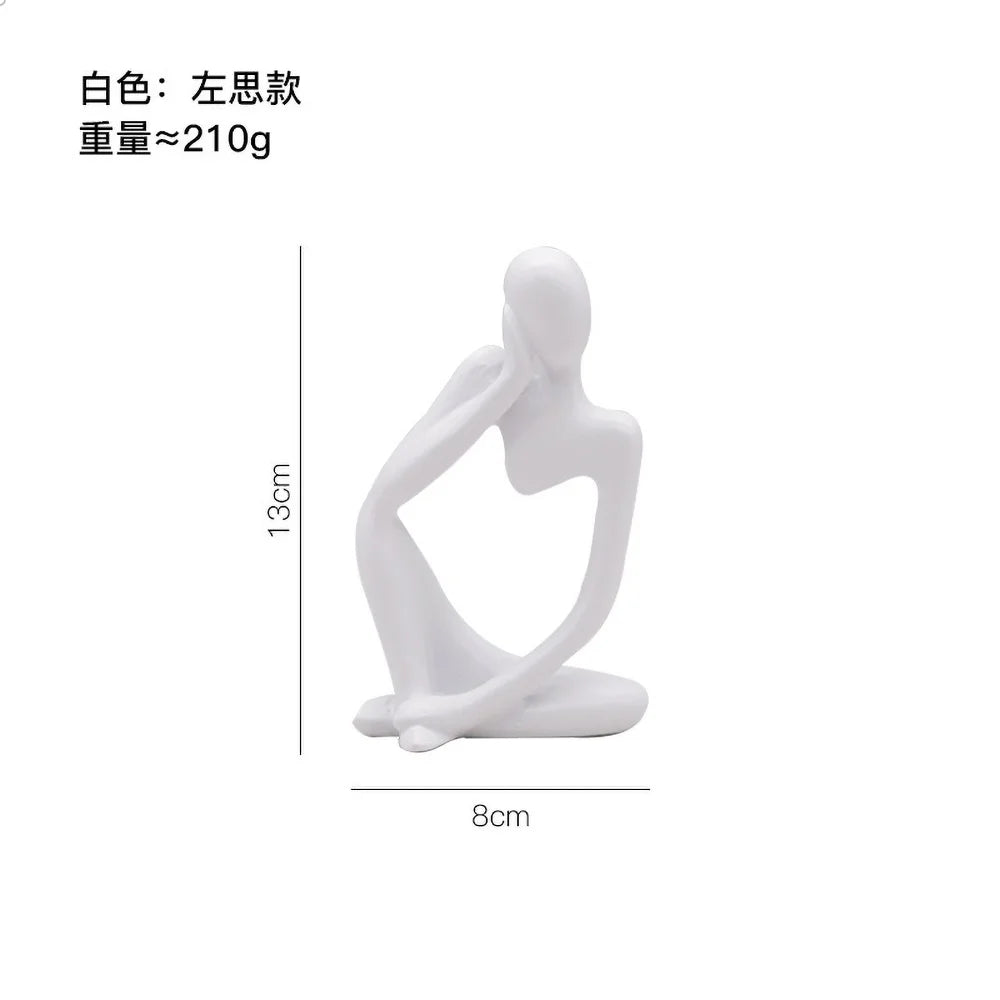 Escultura Figura Sentada