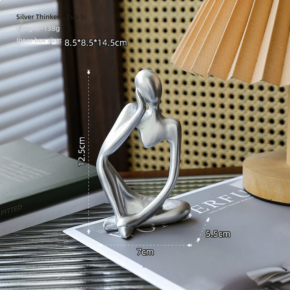 Escultura Figura Sentada